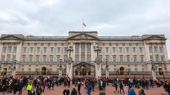 The flag at Buckingham Palace fly's at half mast as people pay their respects. Picture: AFP