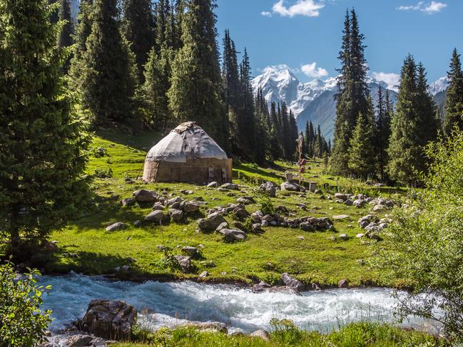 A yurt, or classic wool house of Kyrgyzs nomads, on the river side in the Jety-Oguz valley, Kyrgyzstan.