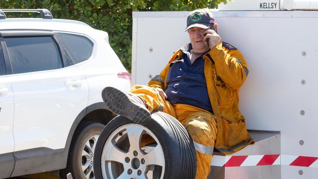 A rural firefighter is seen at the Peregian Springs Control in Peregian Springs, Queensland, Thursday, September 12, 2019. Relieved residents of some bushfire-affected Sunshine Coast suburbs have been allowed to return home after being evacuated on Monday. Picture: AAP Image/Rob Maccoll