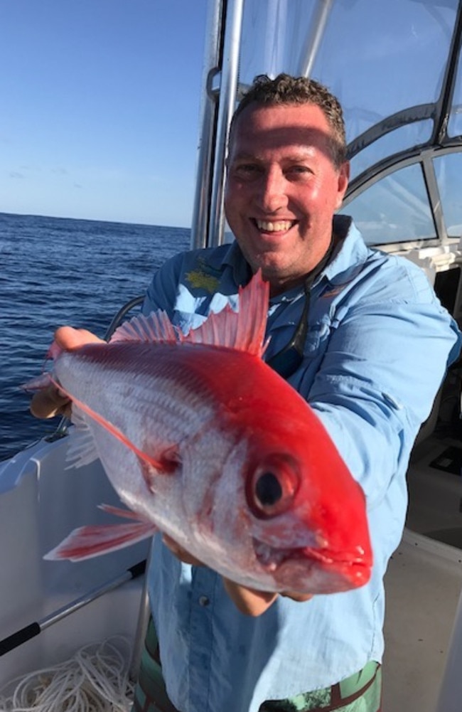 Doug Burt with a quality flame snapper caught off Point Lookout.