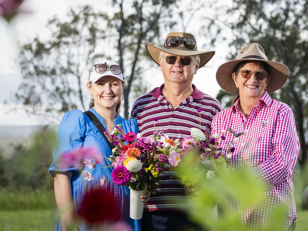 Margaret Lyons (left) with Tony and Christine Diete with their summer blooms as Karinya in the Valley host a pick your own flower session, Saturday, January 4, 2025. Picture: Kevin Farmer