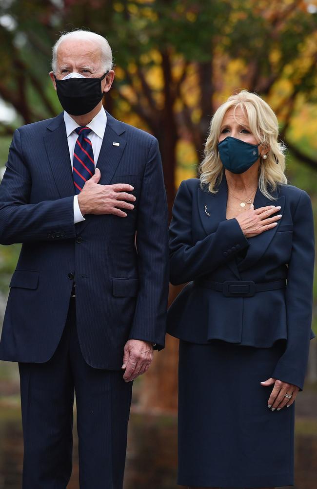 US President-elect Joe Biden and his wife Jill Biden pay their respects during a Veterans Day stop at the Korean War Memorial Park in Philadelphia, Pennsylvania. AFP