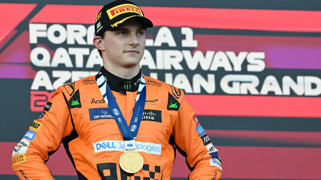 McLaren's Australian driver Oscar Piastri celebrates on the podium after winning the Formula One Azerbaijan Grand Prix. Picture: Natalia Kolesnikova/AFP