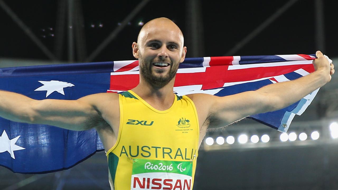 Scott Reardon celebrating his 100m T42 gold in Rio.