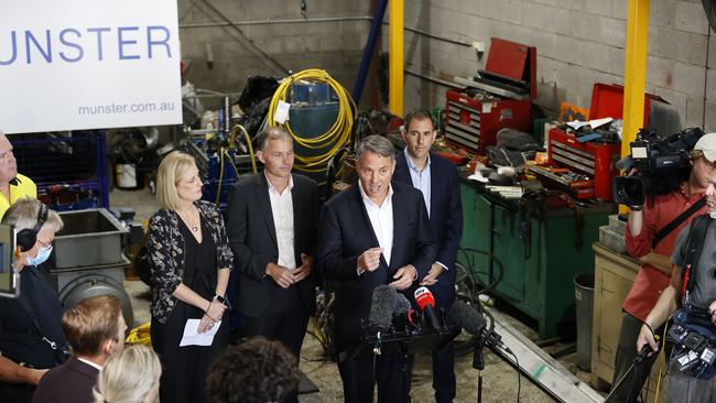 While the leader’s away: Katy Gallagher, left, Richard Marles, second from right, and Treasury spokesman Jim Chalmers, far right, along with Labor candidate for Forde Rowan Holzeberger, on the campaign trail in Brisbane. Picture: Tim Hunter.