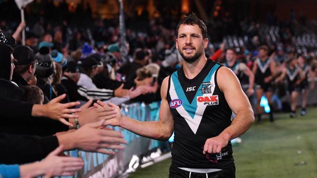 Travis Boak of the Power celebrates with the crowd after the Round 6 win over North Melbourne at Adelaide Oval. Picture: AAP Image/David Mariuz