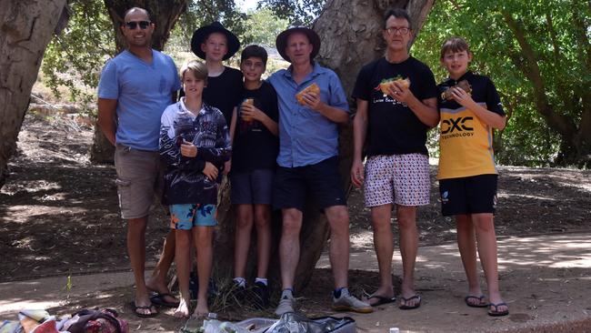 L-R: Mark Desouza, Rex Scambary, Oliver Wallace-Smith, Jasper Desouza, Hugh Wallace-Smith, Greg France, and Victor France were passing through Katherine on their way to a canoe safari in Lake Argyle. Picture: Sierra Haigh