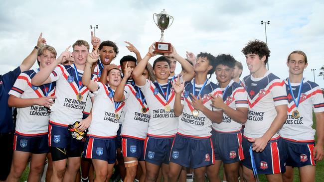 The Central Coast Roosters celebrate after beating the Newcastle-Maitland Region Knights 18-10 in the Andrew Johns Cup grand final.