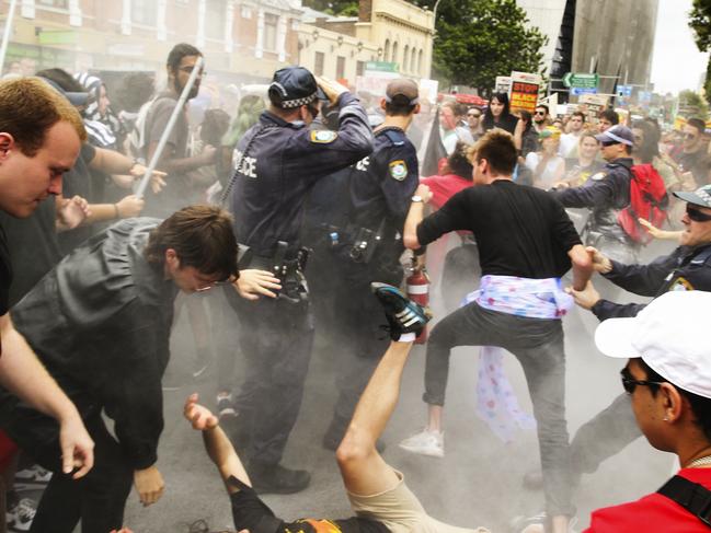 Police clash with protesters during the Invasion Day Rally 2017 at Broadway, Chippendale, today.Picture: Justin Lloyd