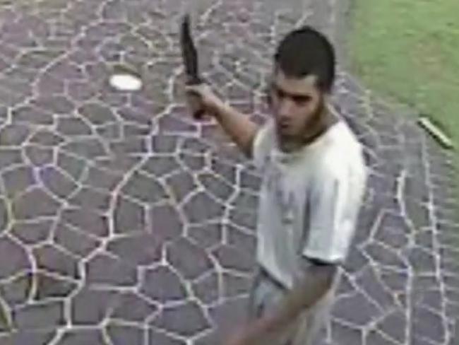 11/09/2016 Screengrab from 'A Current Affair' showing 22-year-old Ihsas Khan, holding a large knife during an alleged terror attack in Minto, 48 km south-west of Sydney. Khan stabbed 59-year-old Wayne Greenhalgh before police officers arrived and restrained him. Credit: ACA