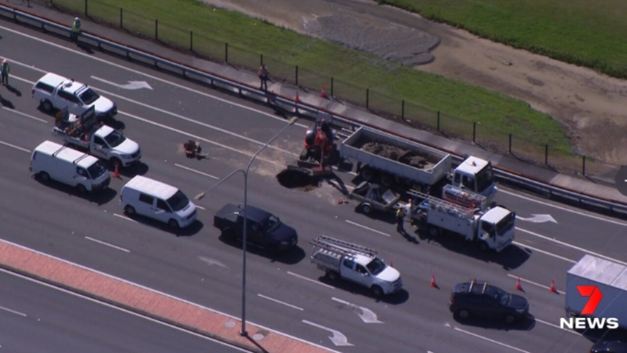 Southport-Burleigh Rd sinkhole: Traffic delays after road opens up ...