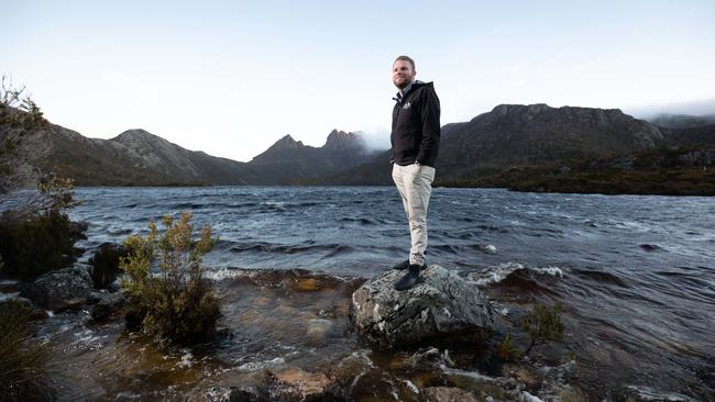 Cradle Mountain Lodge general manager Tim Buckton at nearby Dove Lake: ‘We are absolutely amazed at the amount of business that we’re currently picking up’. Picture: Peter Mathew