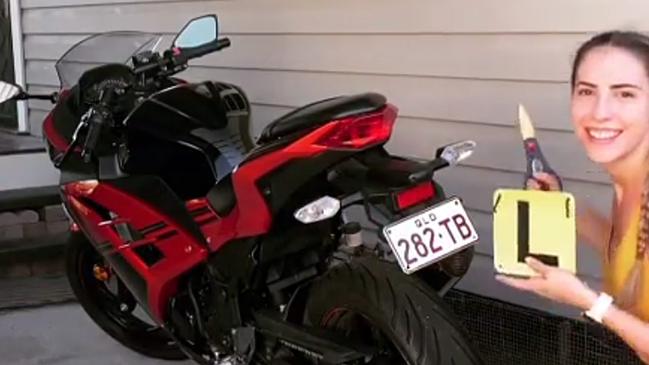 Jennifer Board, 22, was riding her motorbike along Ross River Rd on Friday night when a stolen Hyundai and a Holden Statesman crashed, forcing the Holden onto the other side of the road and hitting the woman’s sports bike.