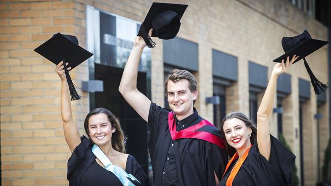 UTAS graduations at Hobart, (L-R) Lauren Wiggins, Thomas Bailey and Jessica Martin. Picture Chris Kidd