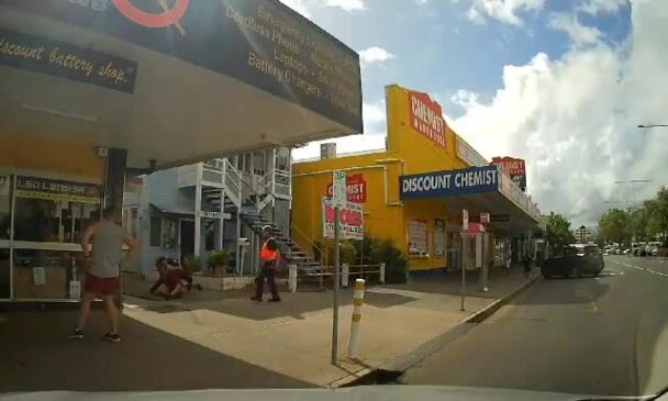 Cairns police officer crash tackles alleged offender