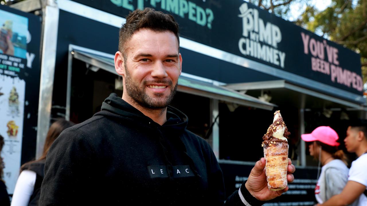 Pedj Bojic owner of Pimp my Chimney holds one of his famous deserts Naughty nuts at the Cherry Blossom Festival in Auburn(AAP IMAGE / Angelo Velardo)