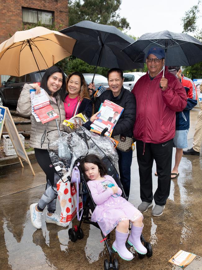 Eliza Swainson and daughter Kelsey in the stroller, Ester Taktak, and Ning and Harold Hettiaratchy. Picture: Brendan Read