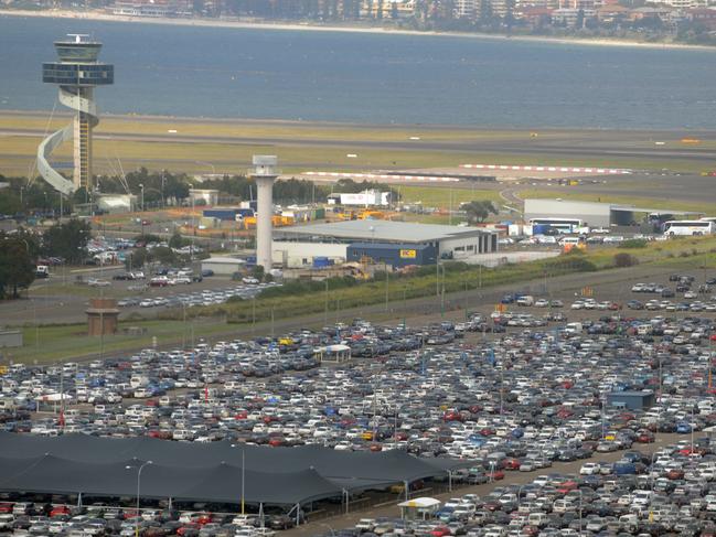 Stock image from an aerial view of the long term carpark and control tower at Sydney International Airport , Sydney, Sunday, Nov. 15, 2009. (AAP Image/Dean Lewins)