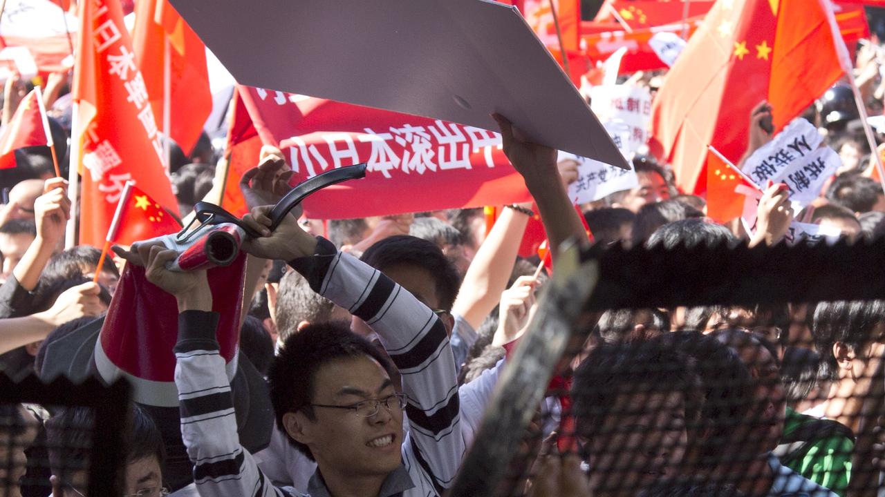 Chinese demonstrators during an anti-Japanese protests outside the Japanese Embassy in Beijing Saturday on Sept. 15, 2012. Picture: Andy Wong/AP