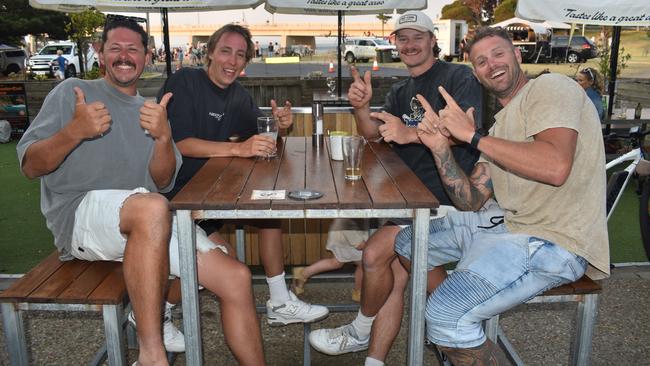 Matt Walls, Noah Merrett, Jeremy Homewood and Christian Merrett at the San Remo Christmas Carols at the foreshore on Friday, December 20, 2024. Picture: Jack Colantuono