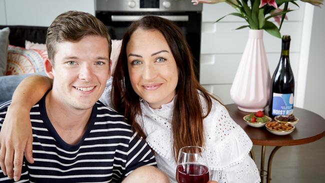 Couple Jasmin Watts, 29, and Ben Tivnen, 30 are not big spenders and don't like to splash too much cash on Valentine's Day. Picture: Nicole Cleary