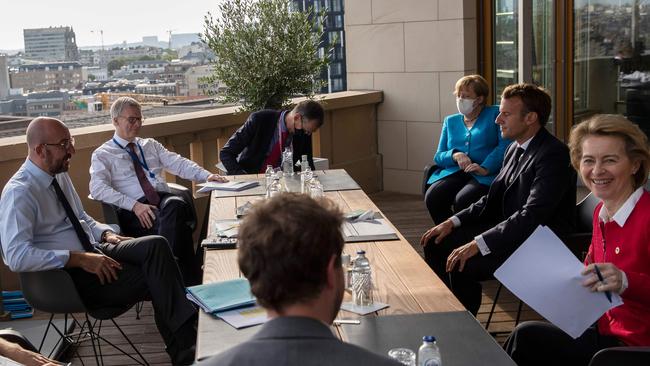 European Council President Charles Michel, left with European leaders including German Chancellor Angela Merkel (third from right) and French President Emmanuel Macron (second from right) in Brussels. Picture: AFP