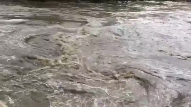 Mary River rushing under Henry Palmer Bridge in Maryborough