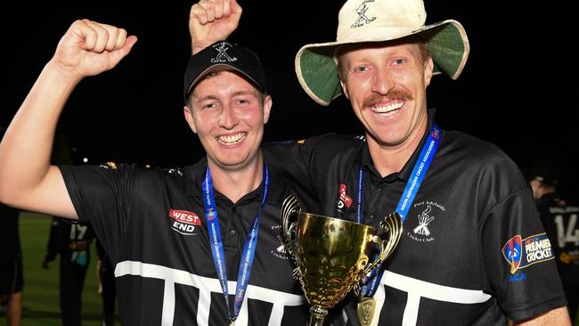 Port Adelaide captain Austin Umpherston (left) and Benton with the SACA Premier Cricket T20 trophy. Picture: Simon Stanbury