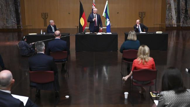 Prime Minister Scott Morrison addresses members of the Coalition during a Joint Party Room Meeting while adhering to social distancing measures at Parliament House.