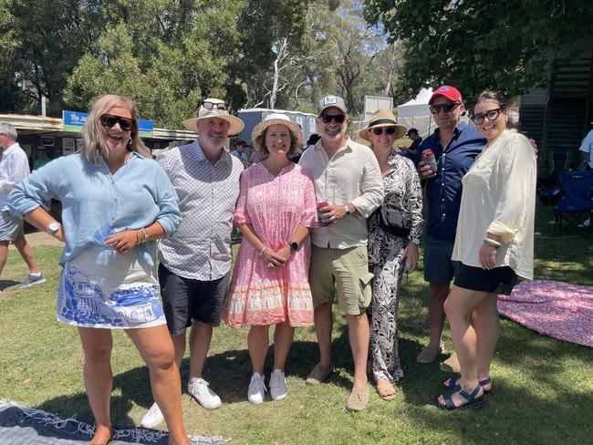 Katherine Malouf with friends and family at the 2025 Hanging Rock Races. Picture: Himangi Singh