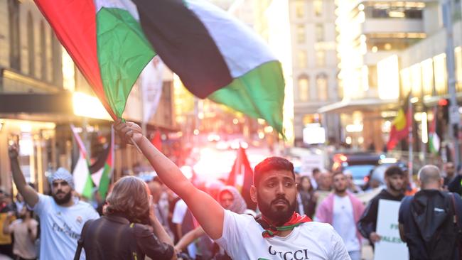 Sydney residents in a ‘Free Palestine’ rally on the forecourt of The Sydney Opera House in Sydney following the outbreak of war between Israel and Palestine. Picture: NCA NewsWire / Jeremy Piper