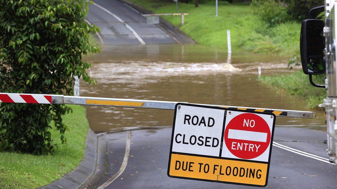 Road closures at Hardys Drive Mudgeerba after flooding. Pics Adam Head