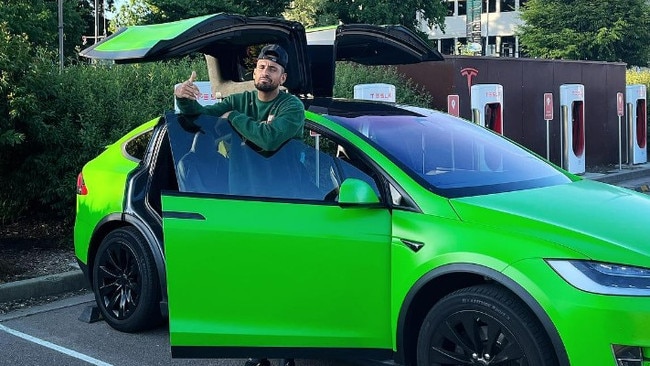 Nick Kyrgios with his Tesla, which was stolen in the incident last year. Picture: Instagram