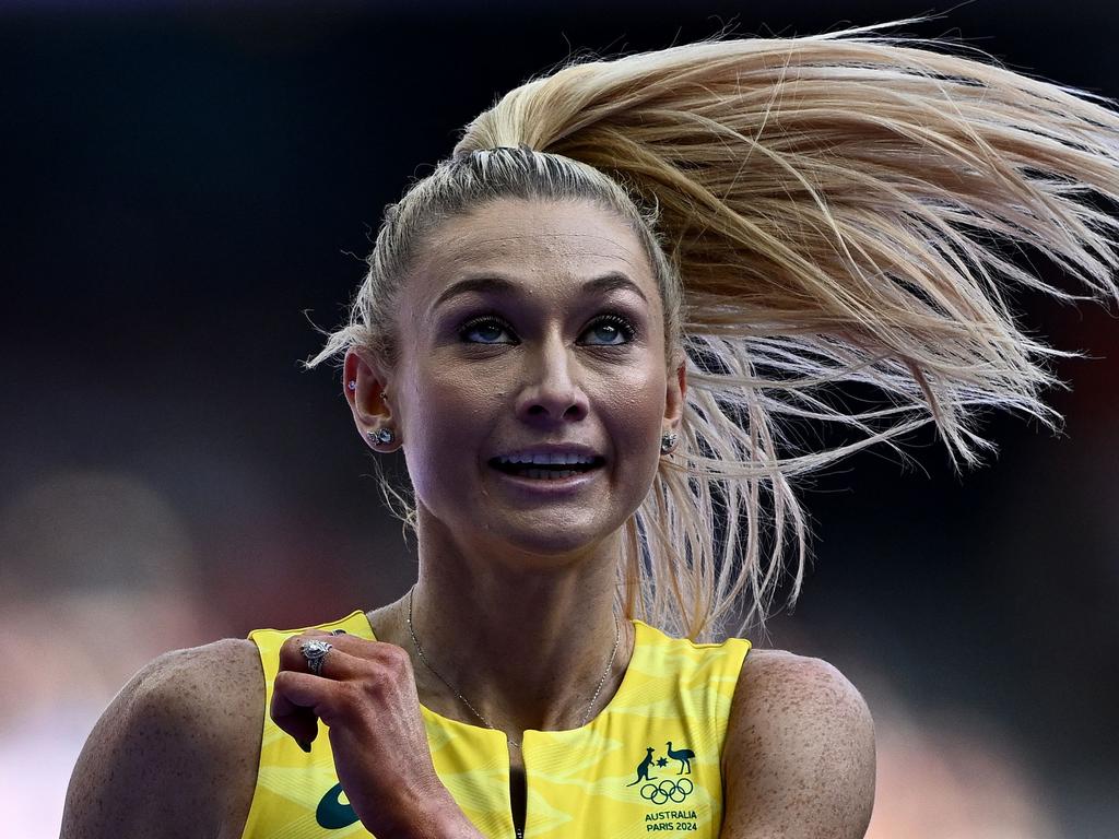 Australia's Jessica Hull reacts after the women's 1500m heat of the athletics event at the Paris 2024 Olympic Games at Stade de France in Saint-Denis, north of Paris, on August 6, 2024. (Photo by Jewel SAMAD / AFP)