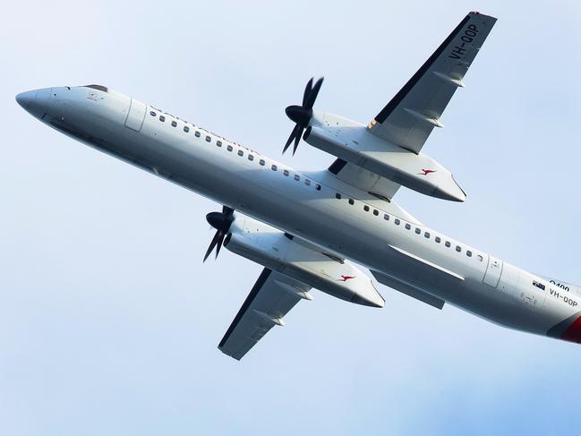 SYDNEY, AUSTRALIA - NewsWire Photos JUNE 14, 2021: A view of a Qantas plane taking off at Sydney Domestic Airport from Port Botany in Sydney Australia. Picture: NCA NewsWire / Gaye Gerard