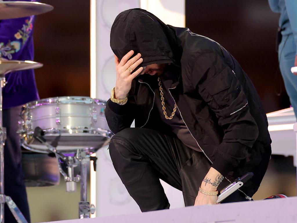 Eminem takes a knee during the Super Bowl halftime show. Picture: Kevin C. Cox/Getty Images