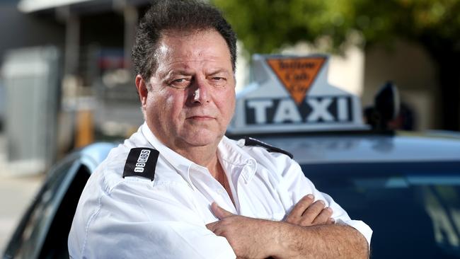 It’s my superannuation.... Taxi owner/driver Con Vokolos says Uber’s ride-sharing service will jeopardise the value of his operating licence. Photo: Mike Burton