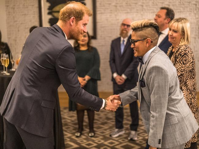 Prince Harry greets Lerisha Naidu, Managing Partner and Head of Baker McKenzie's Antitrust &amp; Competition Practice Group, at a Sentebale reception and panel discussion at The Saxon Hotel in Johannesburg, South Africa. Picture: Getty Images for Sentebale