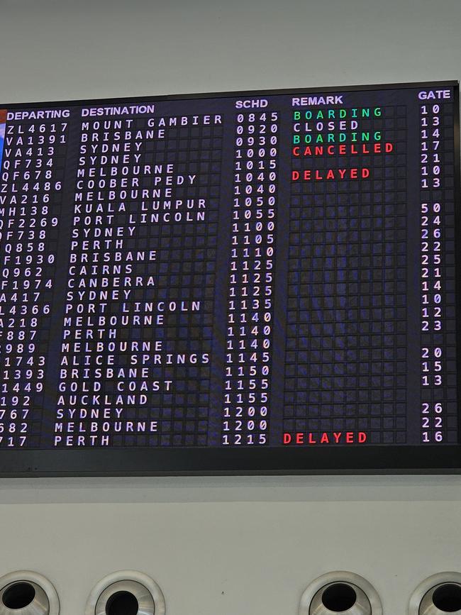 The departures board at Adelaide Airport tells the story. Picture: Matt Turner