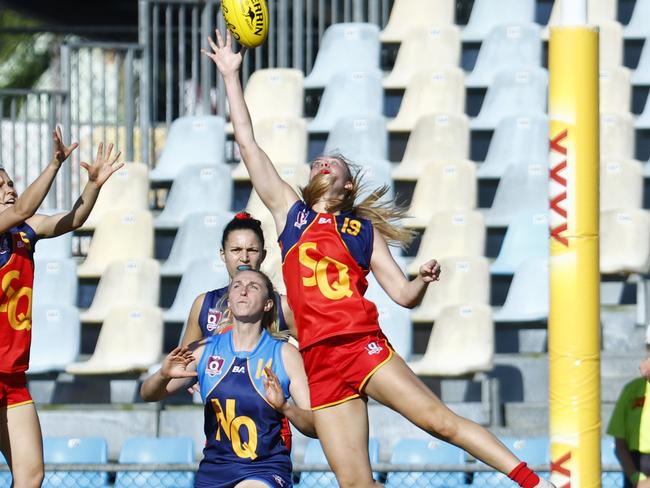 South Queensland's Gracie Roy takes a mark. Picture: Brendan Radke