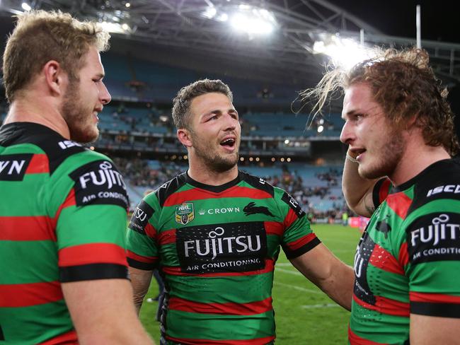 Souths Sam Burgess with his brothers Tom and George after victory in the South Sydney v St. George-Illawarra NRL Semi Final at ANZ Stadium, Homebush. Picture: Brett Costello