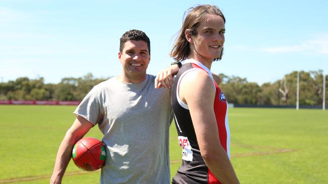 Former St Kilda player Leigh Montagna handed his No. 11 to top Saints draftee Hunter Clark. Picture: Corey Scicluna