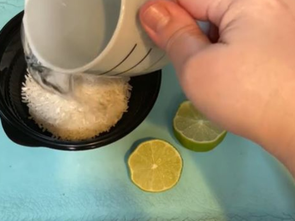 The trend involves putting rice is hot water and drinking the liquid, along with lime juice. Picture: TikTok