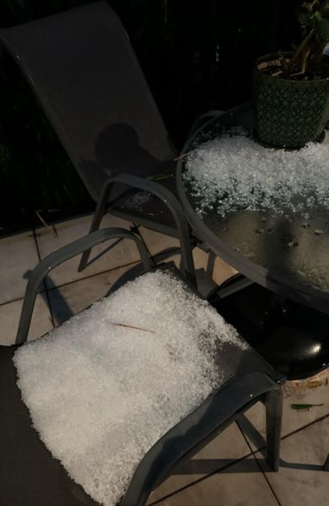 Hail covers a balcony in Brisbane. Photo: Brenda Hayward