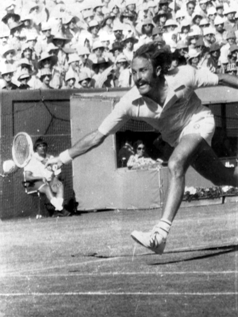 Australian tennis player John Newcombe competing in 1975 Australian Open final match.