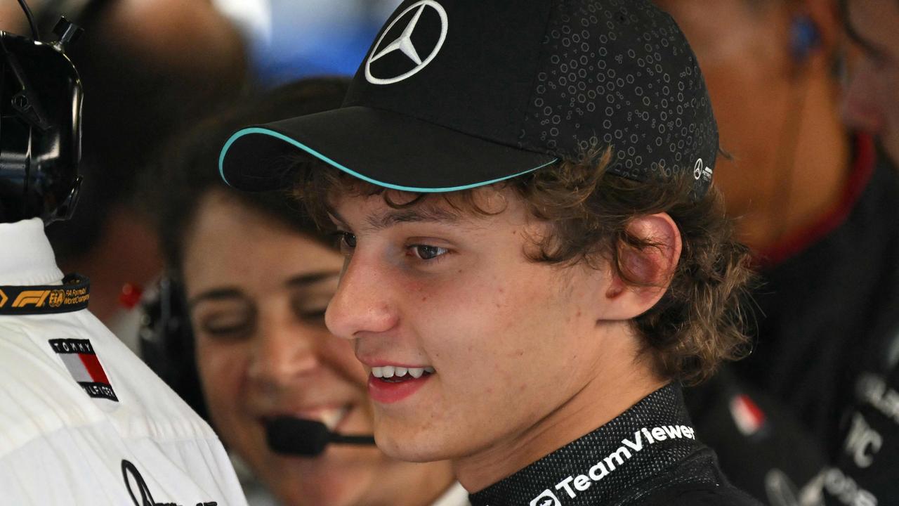 The baby-faced youngster is an F1 driver. Photo by Andrej ISAKOVIC / AFP