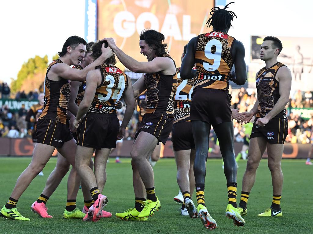 The Hawks celebrate Nick Watson’s sealer. Picture: Steve Bell/Getty Images