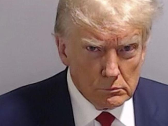 The mugshot of Donald Trump, who entered a not guilty plea and waived his right to an arraignment, delaying his first TV appearance inside a courtroom. Picture: AFP