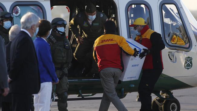 The first batch of 10,000 doses of Pfizer/BioNTech vaccine are unloaded in Santiago, Chile, on Friday. Picture: Getty Images