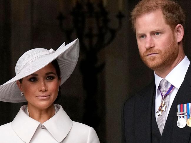 (FILES) Britain's Prince Harry, Duke of Sussex, and Britain's Meghan, Duchess of Sussex, leave at the end of the National Service of Thanksgiving for The Queen's reign at Saint Paul's Cathedral in London on June 3, 2022 as part of Queen Elizabeth II's platinum jubilee celebrations. Prince Harry and wife Meghan Markle were involved in a "near catastrophic car chase" involving paparazzi in New York late on May 16, 2023, a spokesperson for the couple said May 17. "This relentless pursuit, lasting over two hours, resulted in multiple near collisions involving other drivers on the road, pedestrians and two NYPD officers," the spokesperson added. (Photo by Matt Dunham / POOL / AFP)